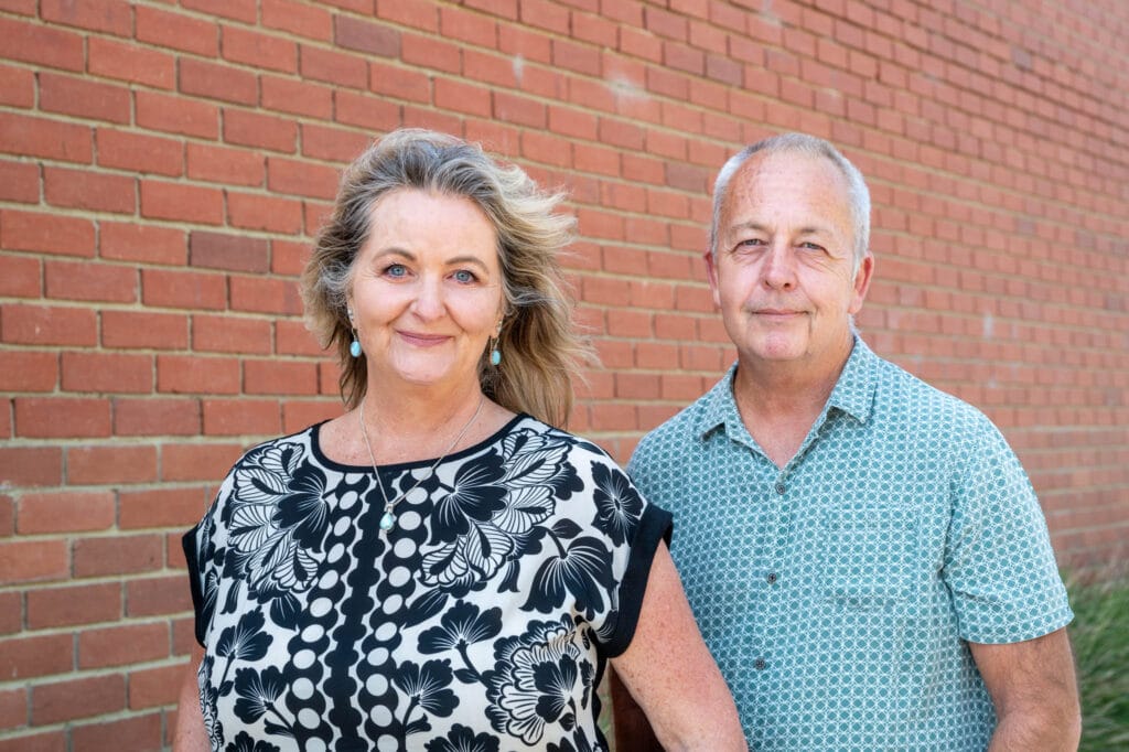 Lisa and blair, reset today TRTP practitioners standing in front of a brick wall